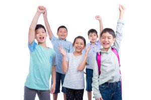 a happy group of Asian children cheering