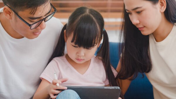 chinese girl and family learning chinese online together