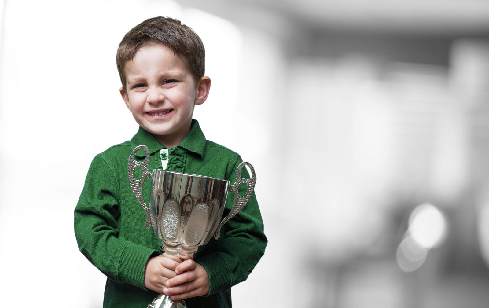 little kid with a trophy