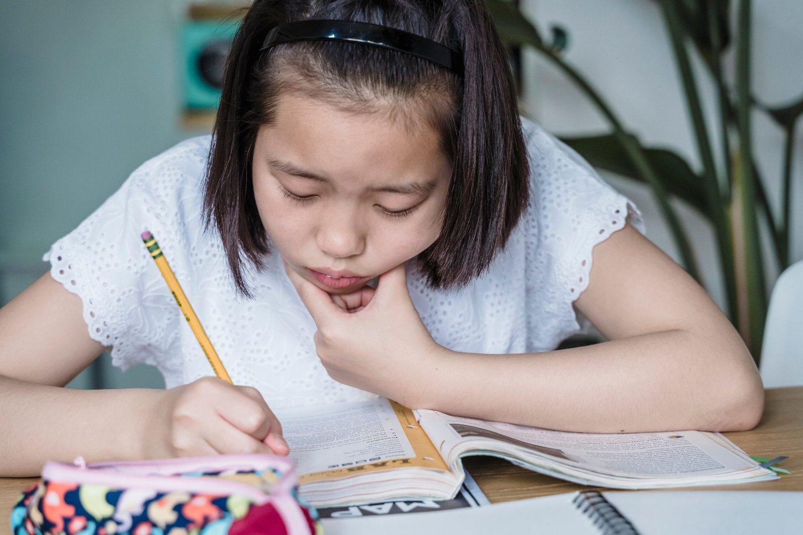 A child struggling to learn Chinese vocabulary